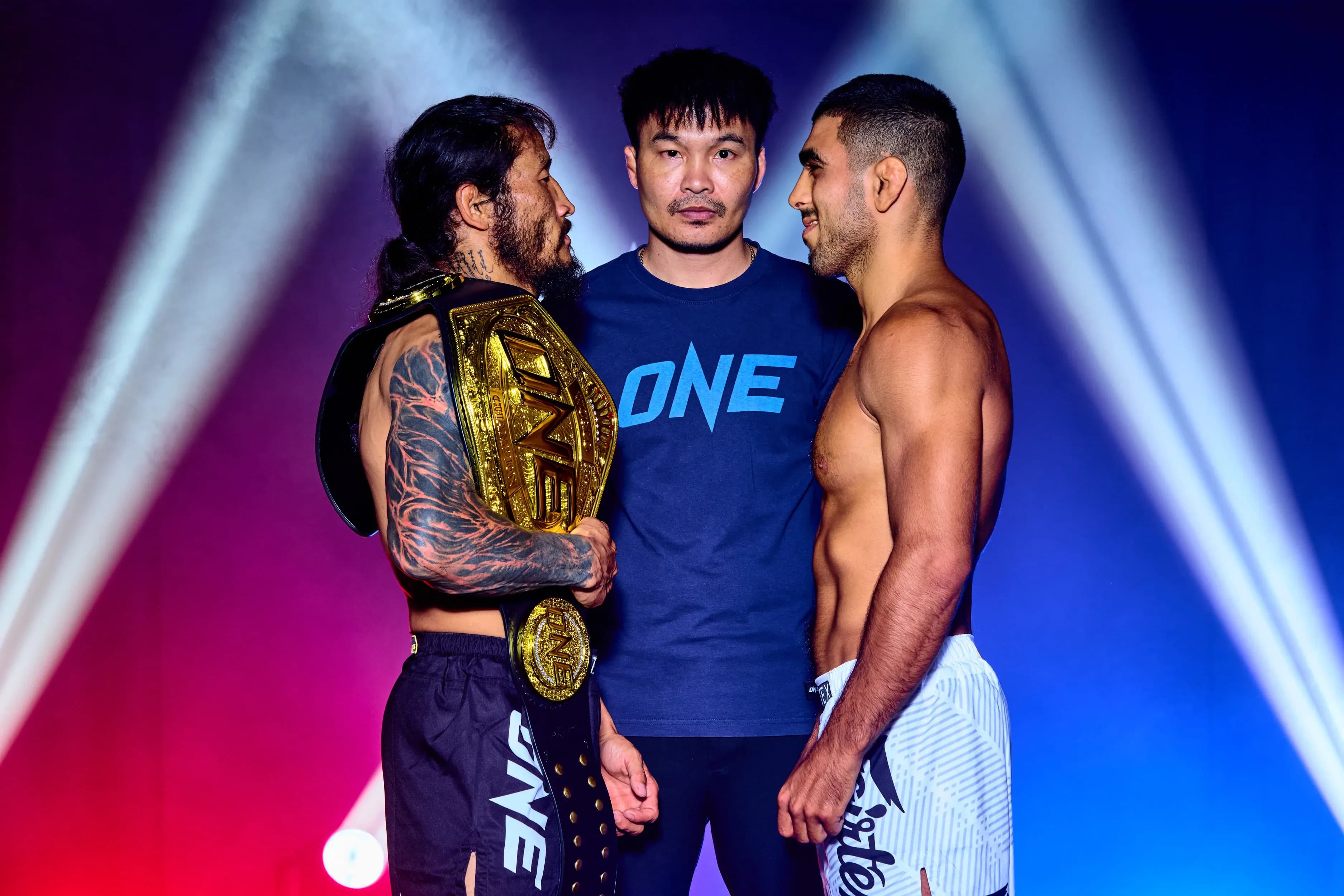 Enkh-Orgil Baatarkhuu with the ONE Championship belt faces off with MMA fighter Elbek Alyshov ahead of The Inner Circle 24