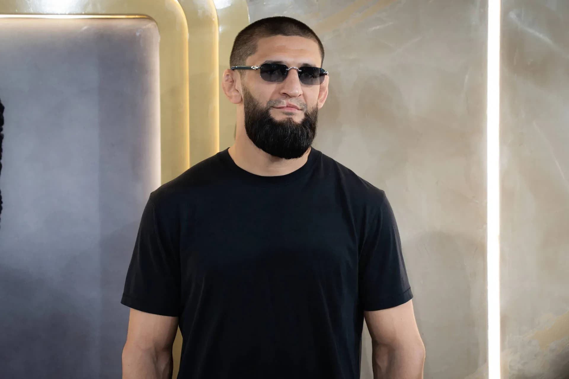 Khamzat Chimaev pokes Sean Strickland with a sly jab after failed rematch demands.