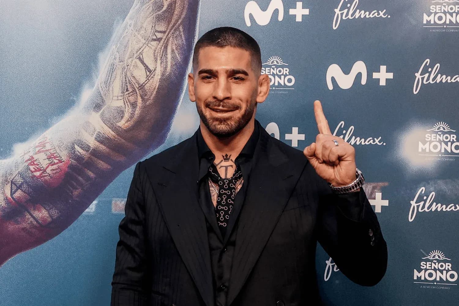 Ilia Topuria poses on the red carpet