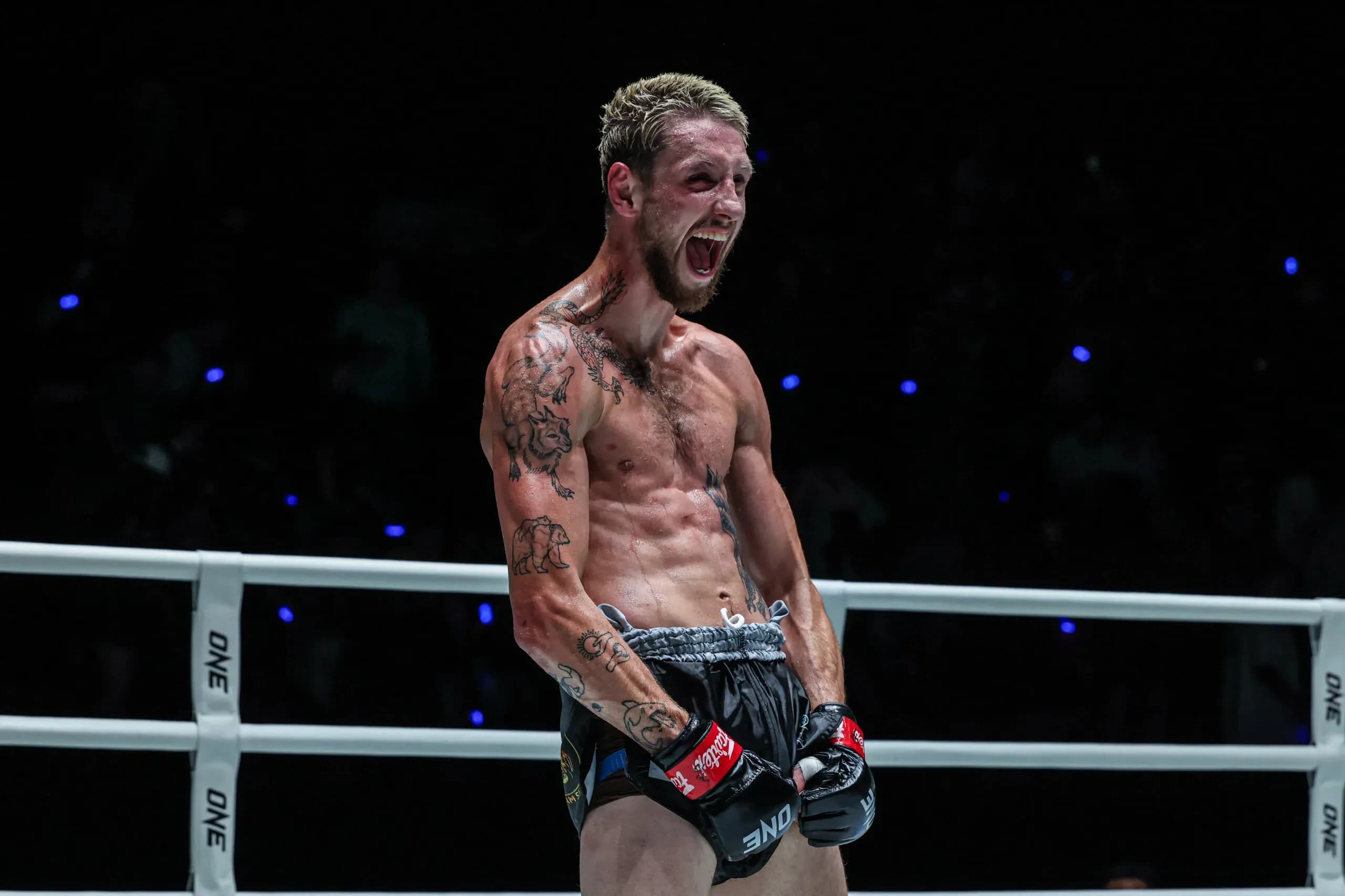 American Muay Thai fighter Luke Lessei poses following his win